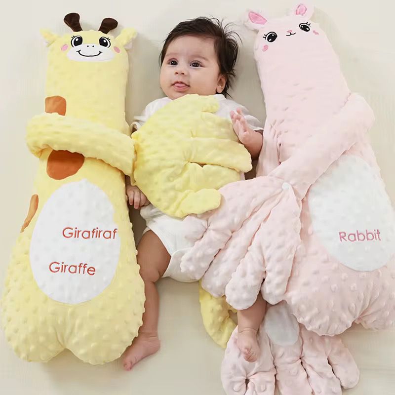 Juguete para dormir imita brazos de mama