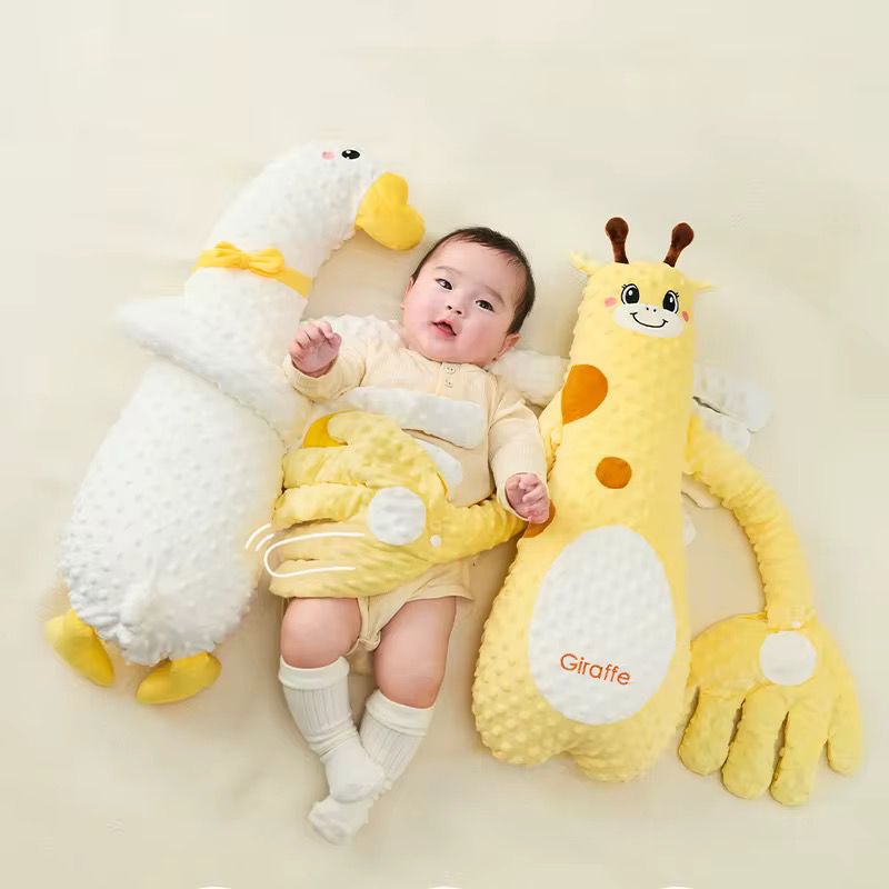 Juguete para dormir imita brazos de mama